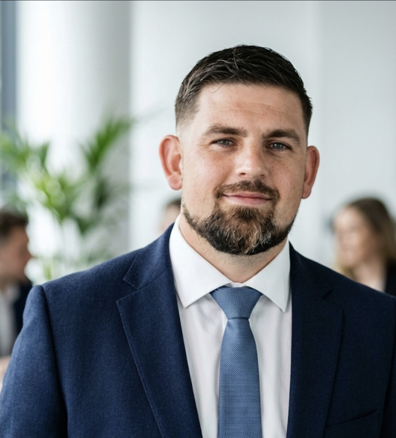 MarketWise Financial founder and commercial finance adviser in a navy suit